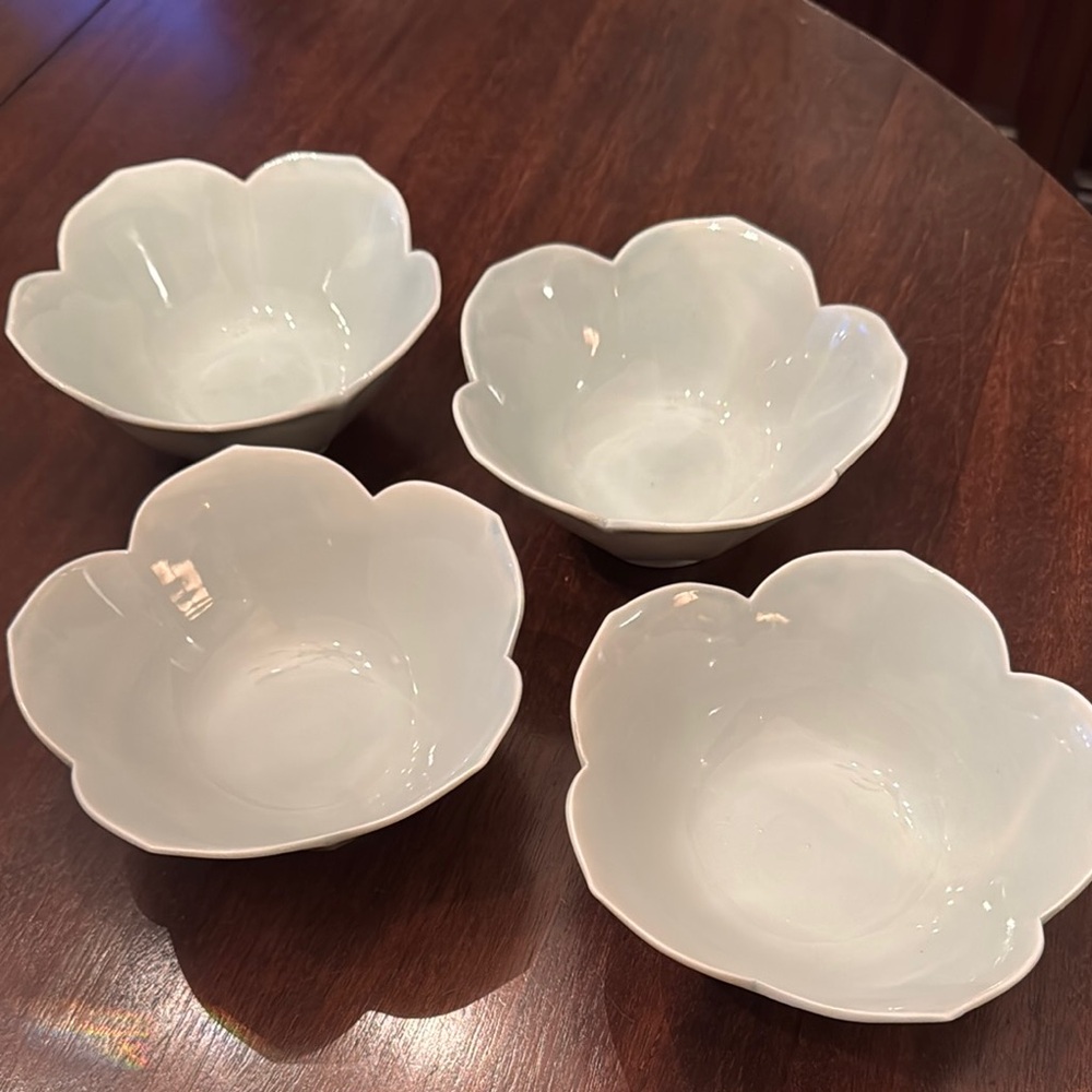 Set of four celadon lotus bowls